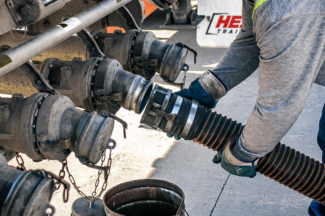 Fuel Truck Driver attaching a hose