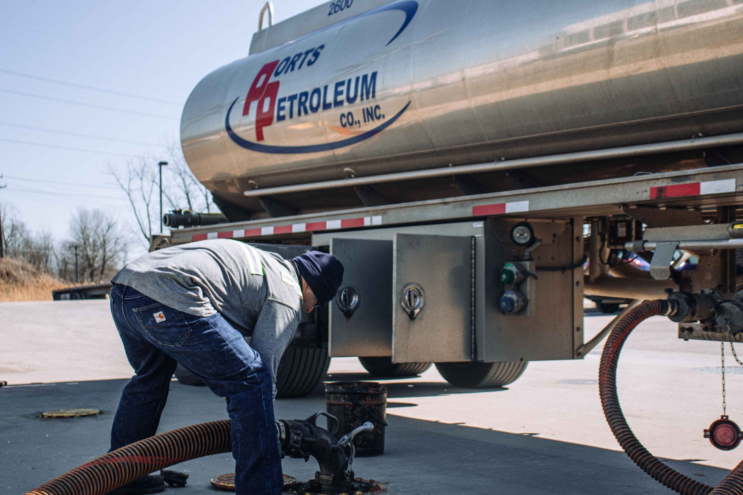 Transport driver dropping diesel fuel